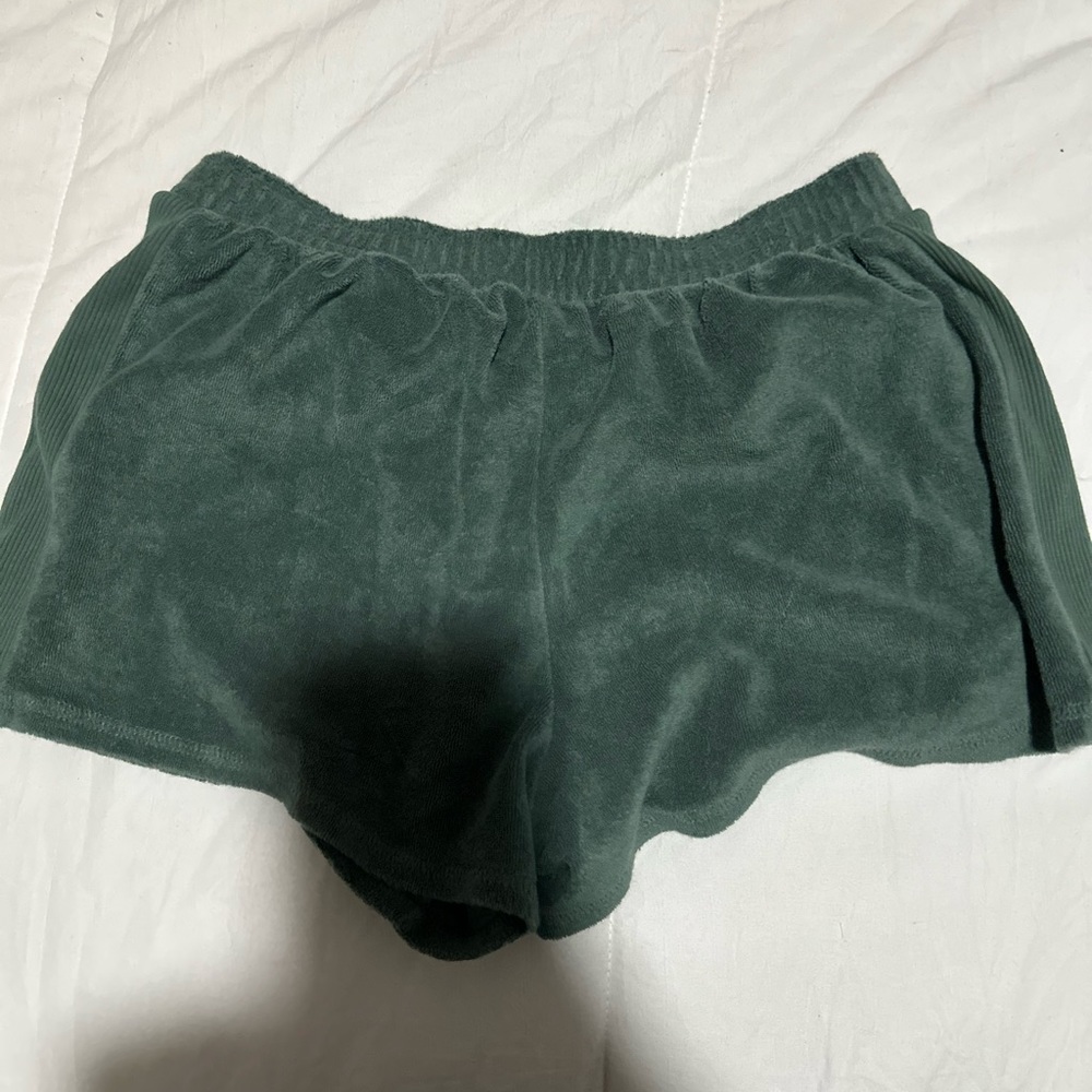 green shirts, towel material on outside and soft on inside,ribbed stripe on side